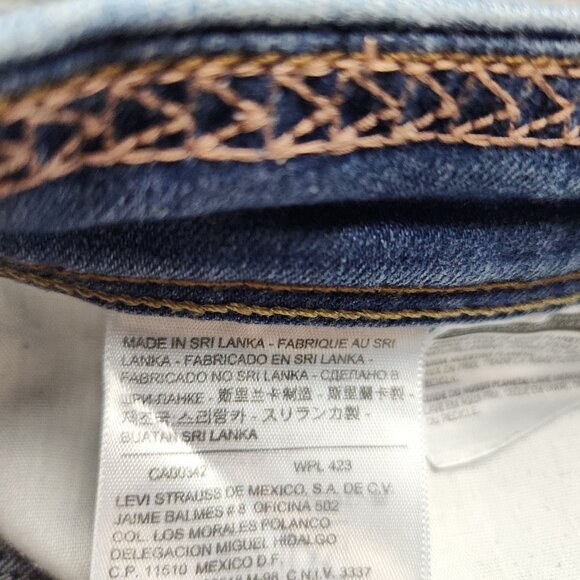 Levi's Mid Length Denim Shorts Size 10 Mid Rise Stretch Zip Fly Medium Blue Wash - Picture 9 of 12